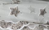 Бежево- коричневые звезды на тюлевой ткани для штор